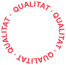 Roda format per lletres que diu "qualitat"